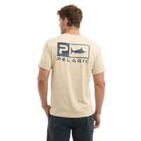 Man wearing a beige t-shirt with Pelagic Fishing logo on the back