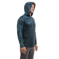 Man wearing a Vaportek blue camouflage hooded Fishing shirt 