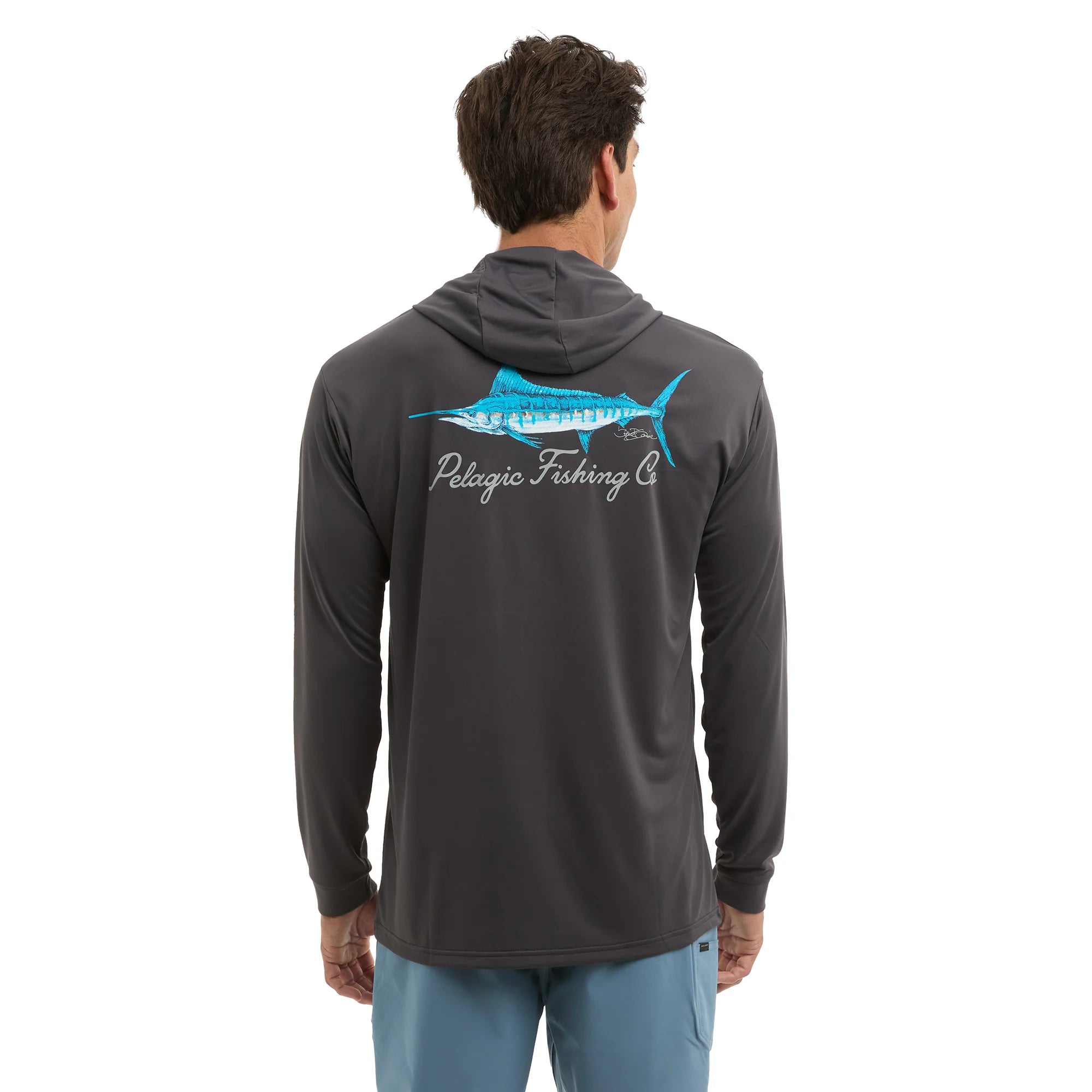 Man wearing a gray hoodie with a fish design and text on the back, on a white background