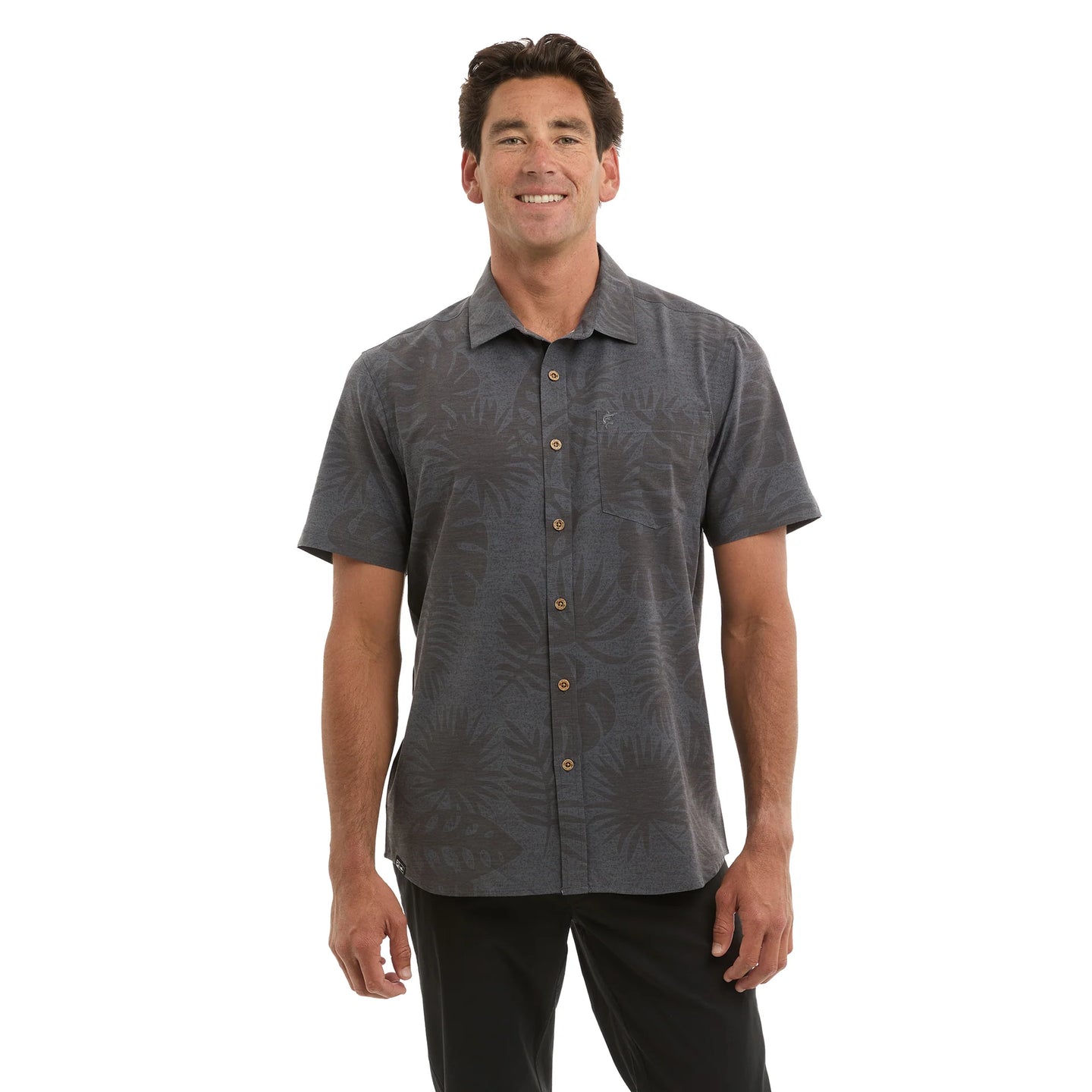 Man wearing a grey patterned shirt 