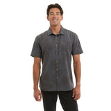 Man wearing a grey patterned shirt 