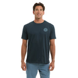 Man wearing a dark blue t-shirt with a Pelagic logo on a white background