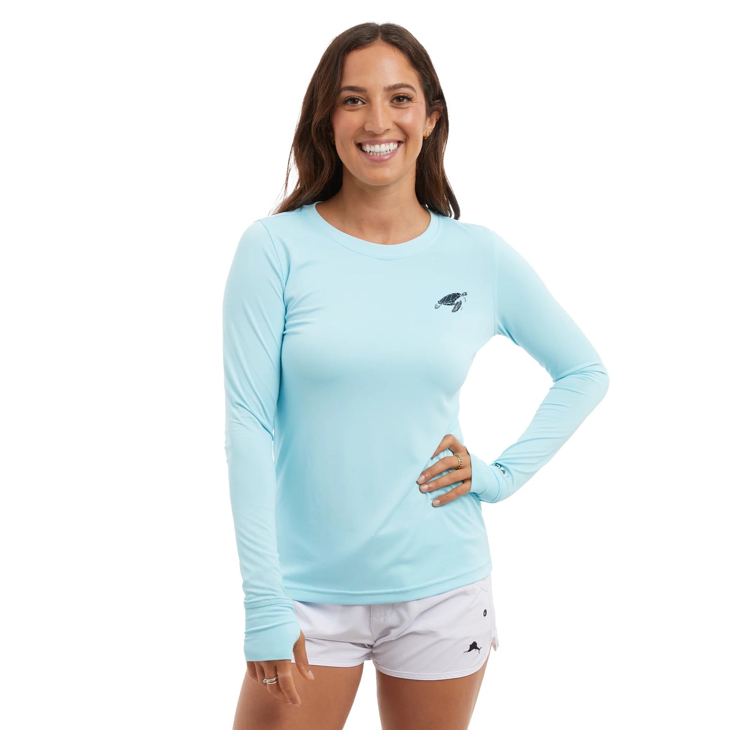 Woman wearing a light blue long-sleeve fishing shirt with a logo on a white background